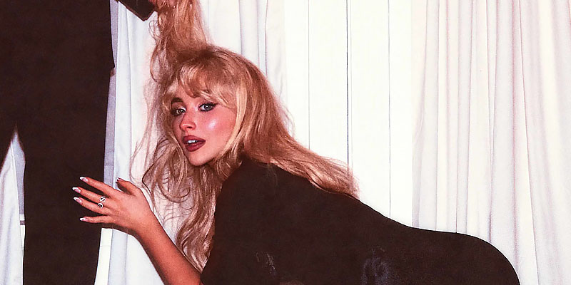 Album cover for Man's Best Friend: Sabrina Carpenter on her knees in front of a man who's holding her hair