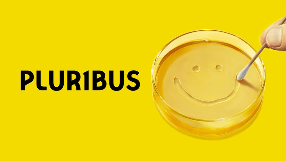 Poster for the TV show Pluribus: the text reads "Pluribus" next to a petri dish with a smiley face on it against a yellow background