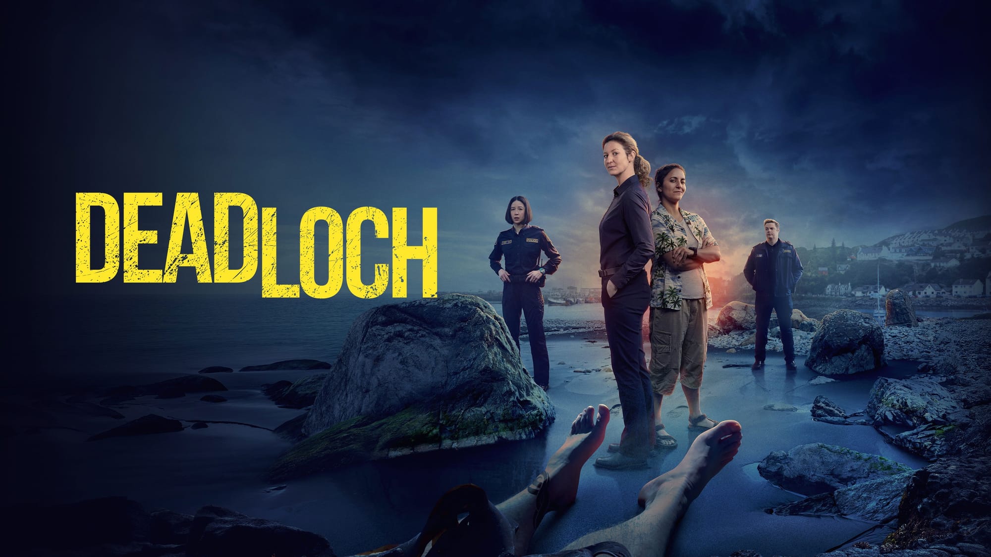Poster for the show Deadloch: detectives Dulcie Collins and Eddie Redcliffe stand next to each other with a dead body on a beach in the forground