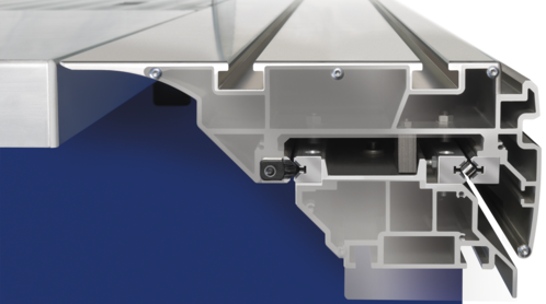 Detaliu tehnic al sistemului de glisare cu role cilindrice X-Roll de la FORMAT4, care asigură o mișcare lină și precisă a mesei mobile.