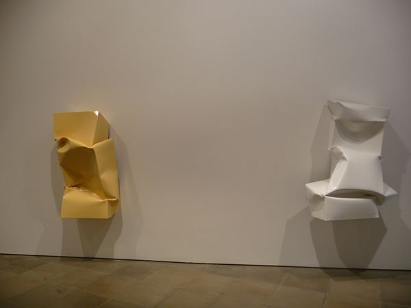 Left: Compressed (cream) 2011, Oil on aluminum; Right: Compressed (white) 2011 Oil on aluminum by Angela de la Cruz